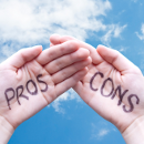 Two hands with pros and cons