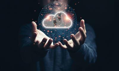 A man holding a simulation of the cloud