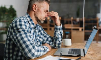 A small business owner is chasing overdue invoices
