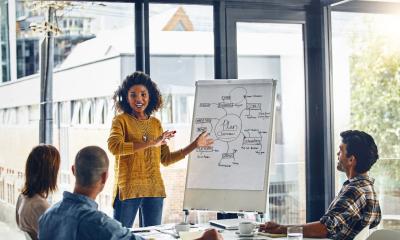 A woman presents her business idea