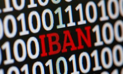 IBAN in red letters on digital background