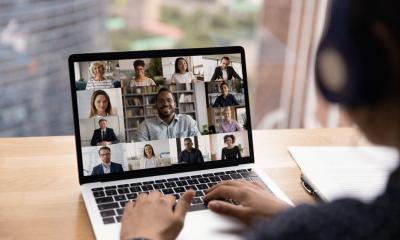 A remote worker man works securely from his home office