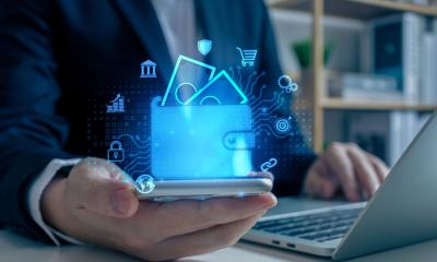 A man uses a financial app on his smartphone