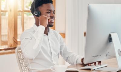 Male virtual receptionist talking to a customer