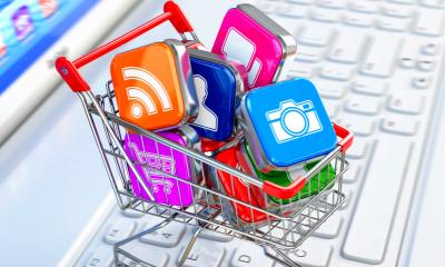 Shopping basket on a keyboard with apps in it