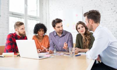 Business owners discussing recent Budget announcement