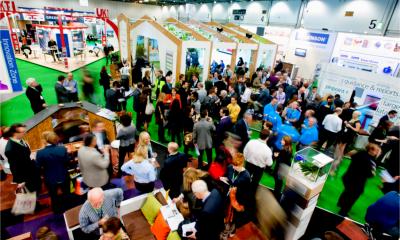 Attendees at an exhibition at ExCel London