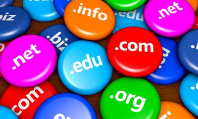 Website and Internet domain name web concept with domains sign on colorful badges Website and Internet domain name web concept with domains sign on colorful badges