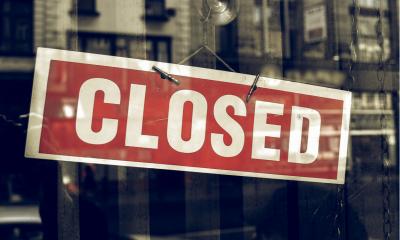 A closed sign in shop window