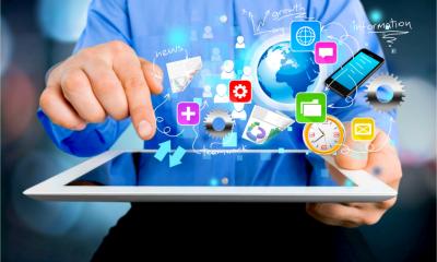 Tablet computer with graphics representing various digital tools