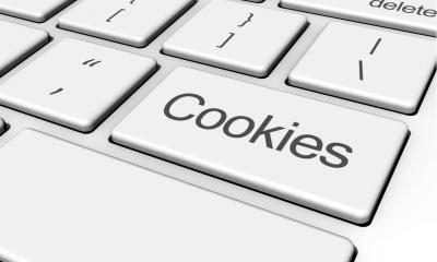 'Cookies' written in grey on a key on a white keyboard