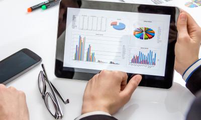 Finance and accounts software Accounting software management information report showing on tablet