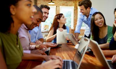 A creative team work together using a range of collaboration tools and apps