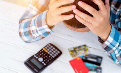 Worried man wonders how he will pay his baills due to late payment