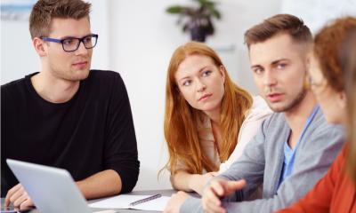 A group of business people having a discussion