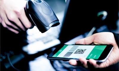 A QR code confirms a booking reservation