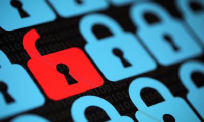 Rows of blue padlocked icons on a screen with one red one that is unlocked