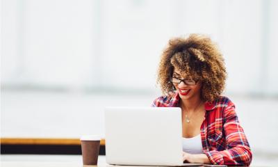 Businesswoman working out her taxes