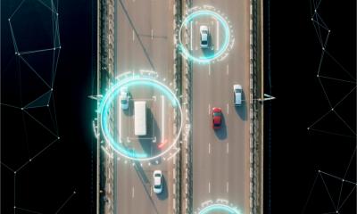 Aerial view of self driving cars being tracked by GPS
